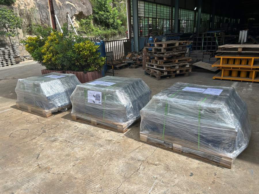 packing concrete block moulds.jpg