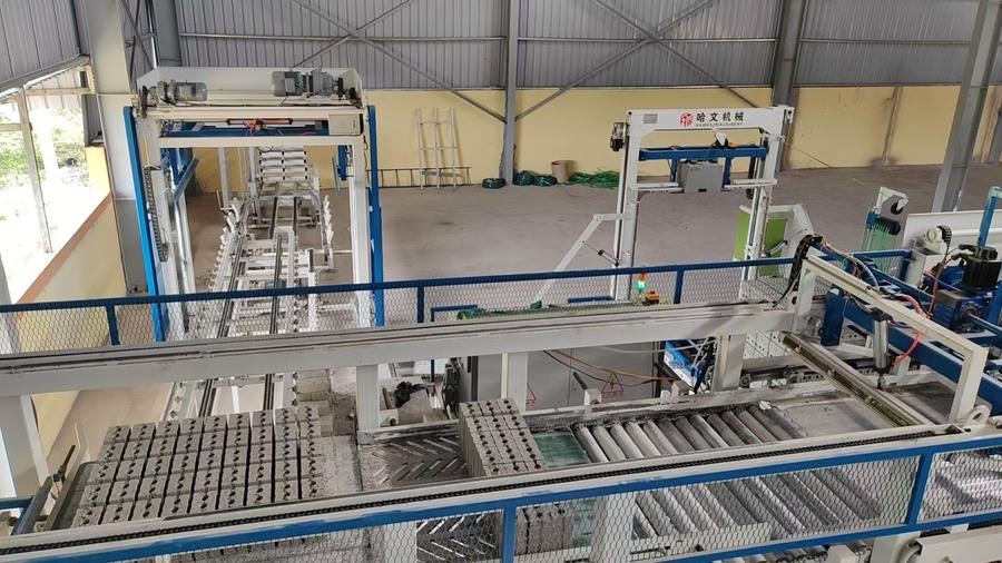 Stable two-hole concrete brick stacks formed by Hawen automatic offline cuber system