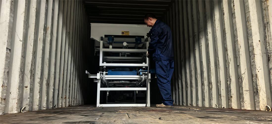 Pallet Feeder and Wet Blocks Conveyor secured inside container for Algeria shipment